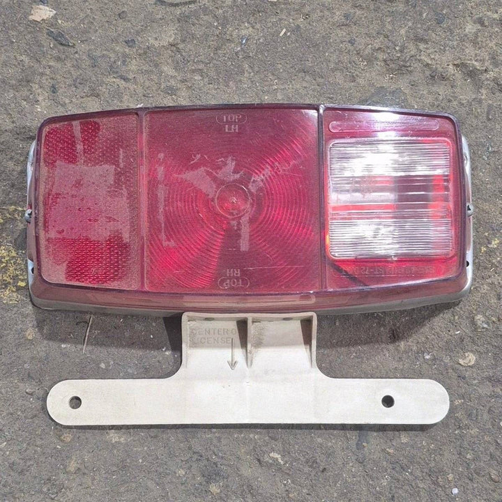Used Miro-Flex RV Tail Light Assembly, With License Plate Bracket, 10 1/8" X 7" X 2 3/4" - 340 - Young Farts RV Parts