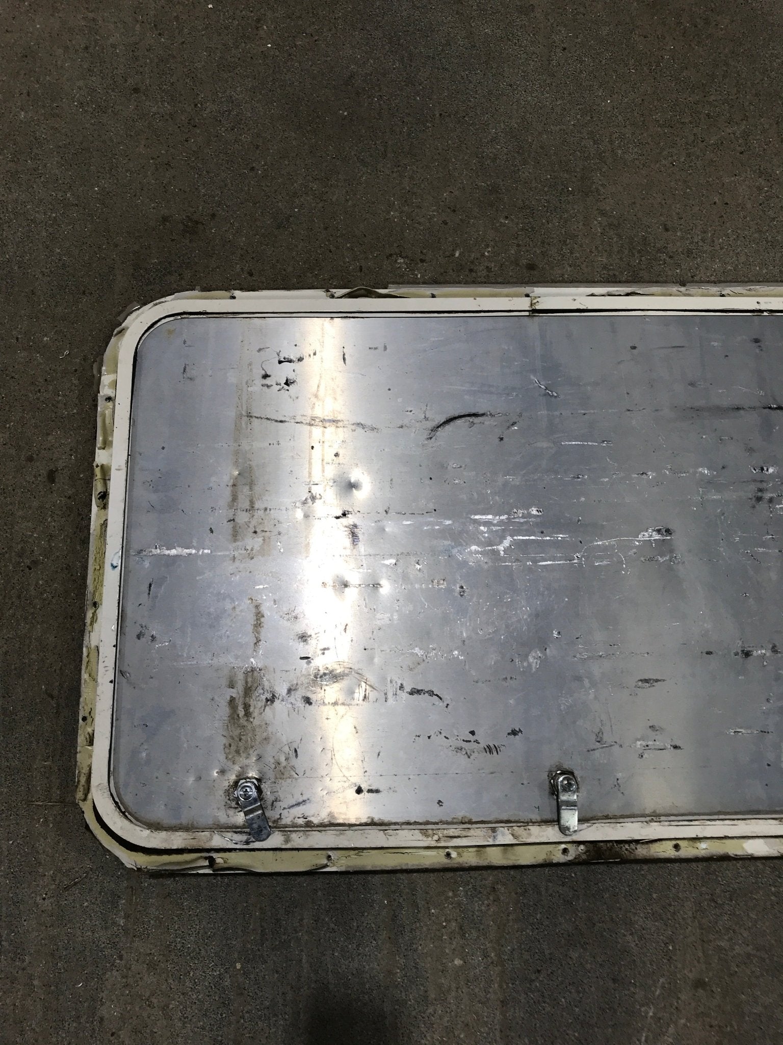 Used Radius Cargo Door 32 1/4" W x 20 1/2" H x 3/4" D - Young Farts RV Parts
