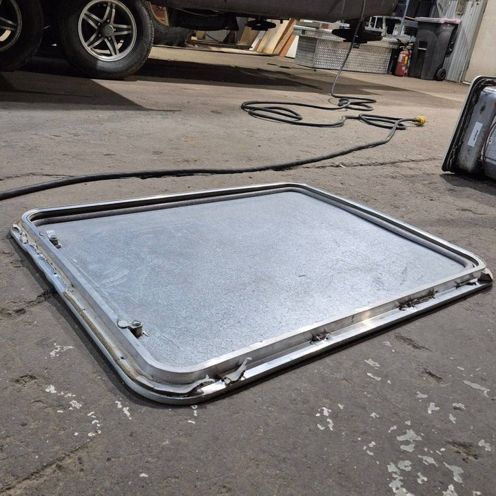 Used Radius Cargo Door - 32.5 X 24.25 X 0.75 - Young Farts RV Parts