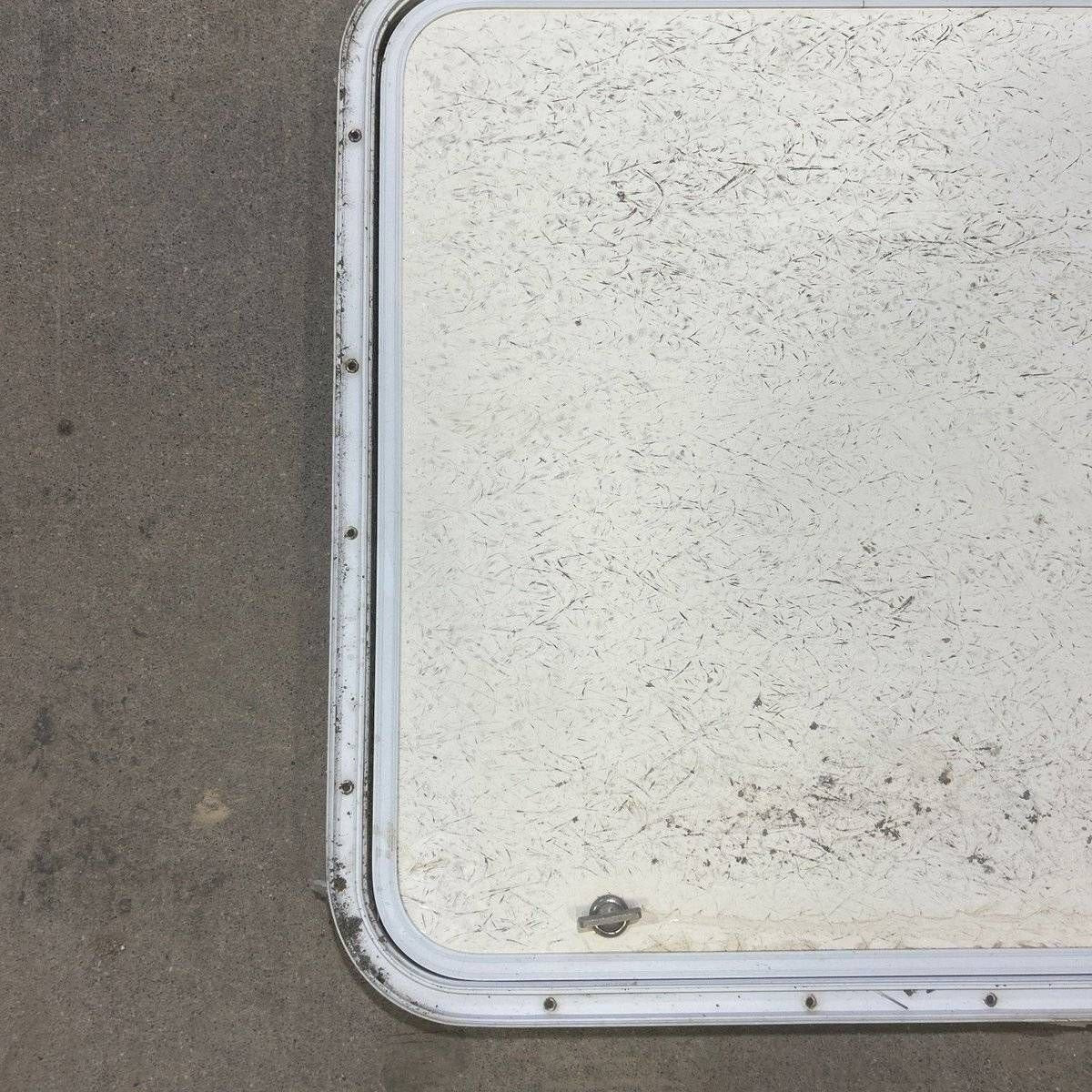 Used Radius Corner Cargo Door - 23.5 X 23.75 X 0.75 - Young Farts RV Parts
