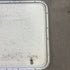 Used Radius Corner Cargo Door - 23.5 X 23.75 X 0.75 - Young Farts RV Parts