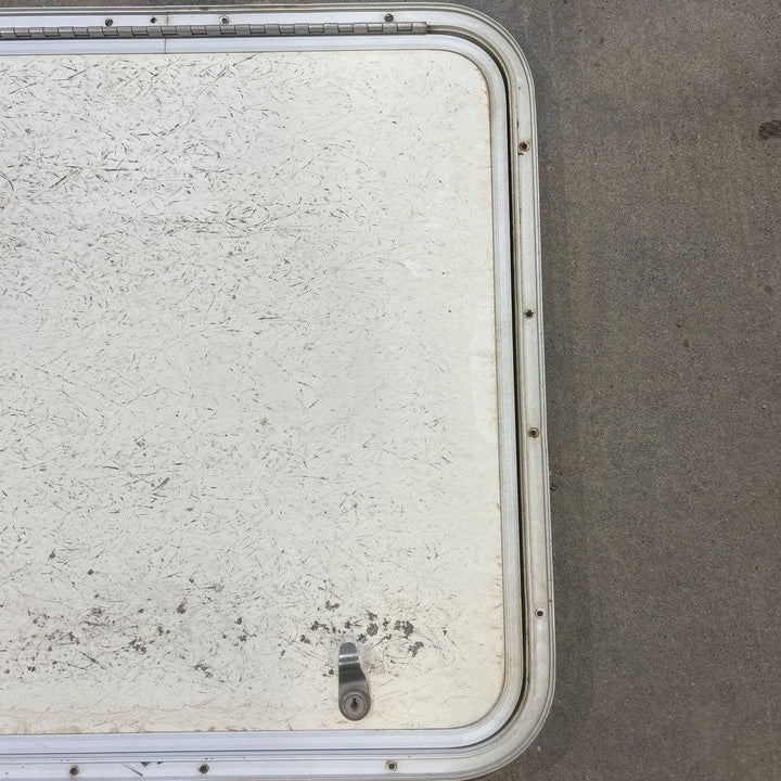 Used Radius Corner Cargo Door - 23.5 X 23.75 X 0.75 - Young Farts RV Parts