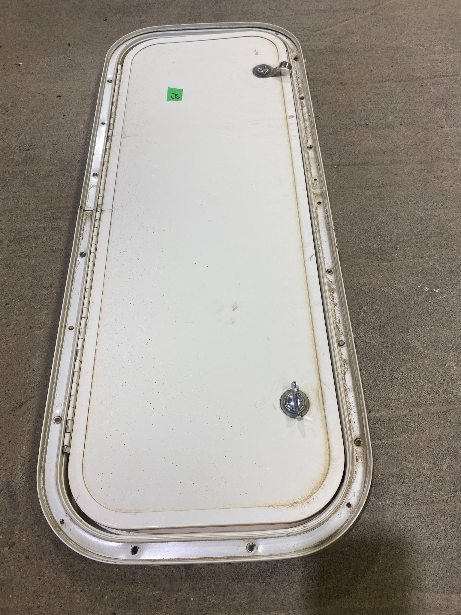 Used Radius Corner Cargo Door 29 3/4" W x 10 3/4" H x 3/4" D - Young Farts RV Parts