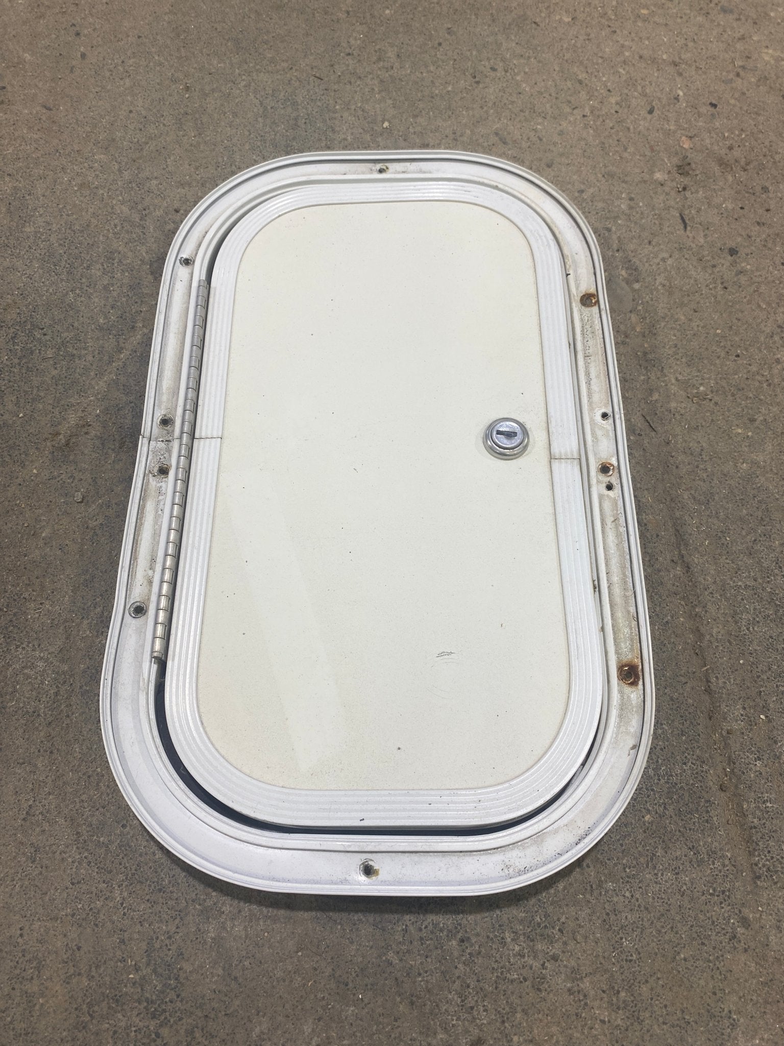 Used Radius Cornered Cargo Door 13 3/4" W x 7 3/4" H x 3/4" D - Young Farts RV Parts