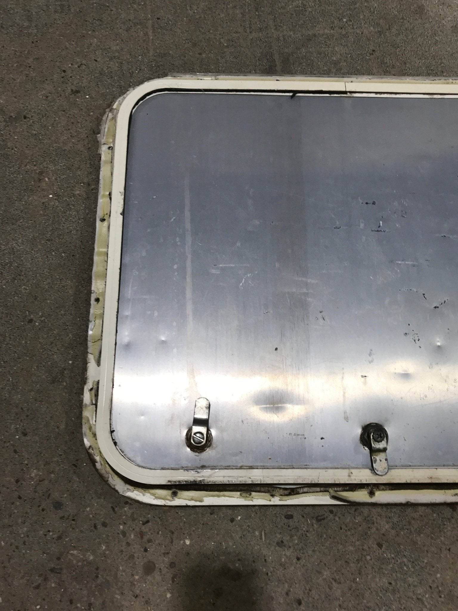 Used Radius Cornered Cargo Door 23 1/4" x 19 1/2" x 3/4"D - Young Farts RV Parts
