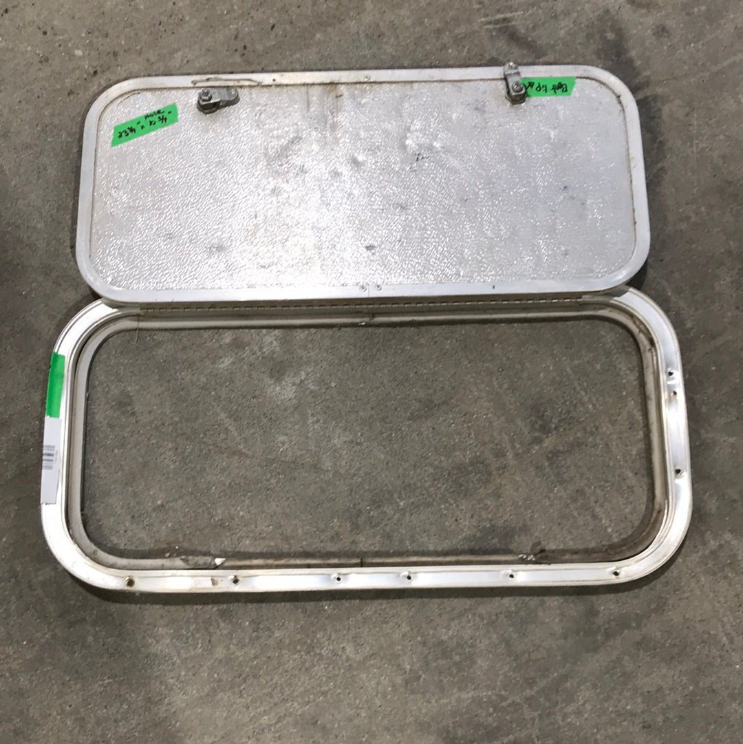 Used Radius Cornered Cargo Door 23 3/4" W x 10 3/4" H x 3/4 "D - Young Farts RV Parts