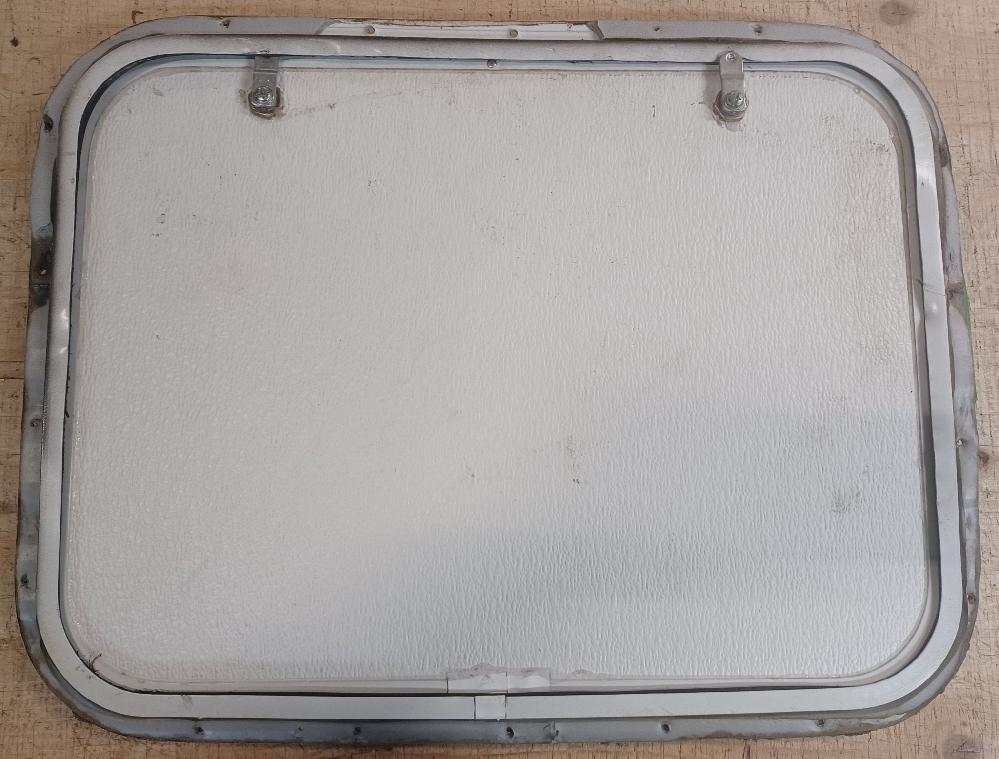 Used Radius Cornered Cargo Door 23 3/4" x 17 7/8" x 5/8" - Young Farts RV Parts