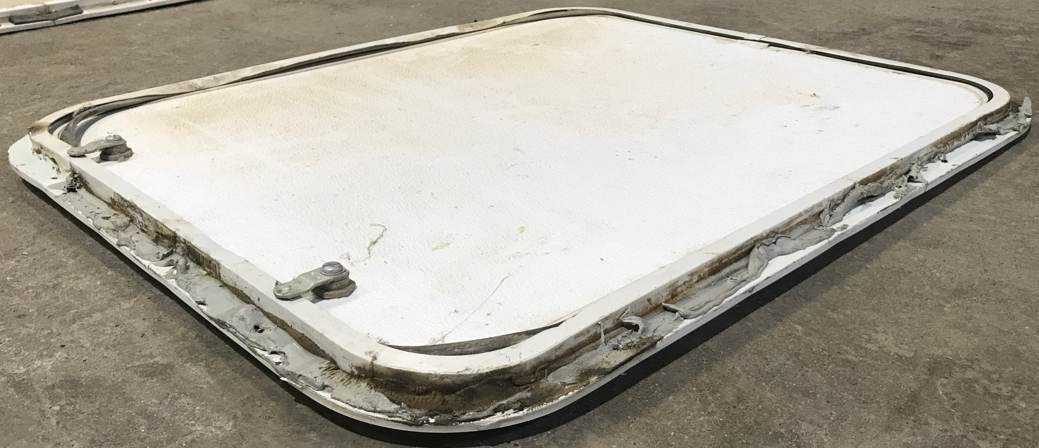 Used Radius Cornered Cargo Door 27 1/2" x 22 3/4" x 1/2" D - Young Farts RV Parts