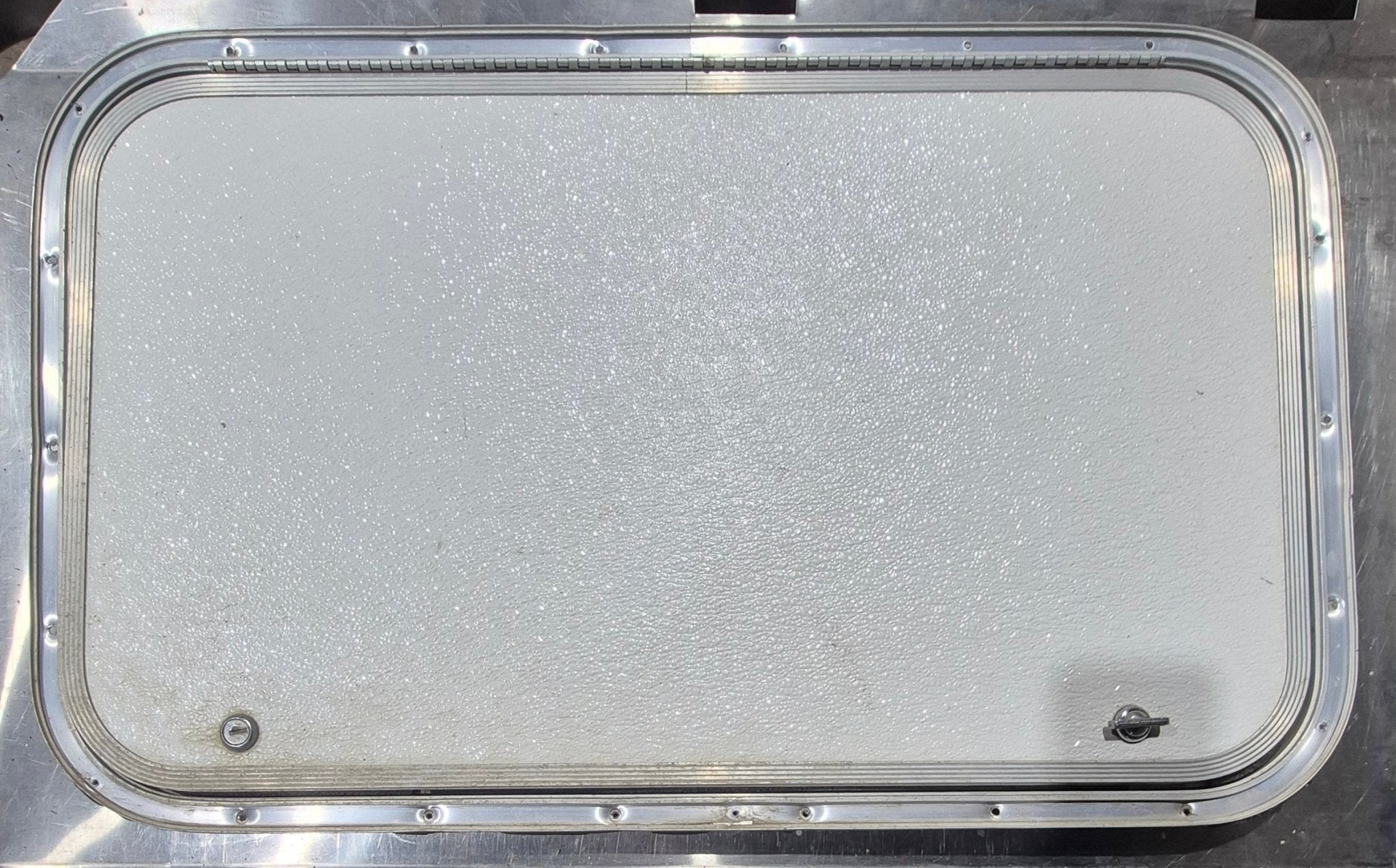 Used Radius Cornered Cargo Door 29 7/8" x 17 7/8" x 5/8"D - Young Farts RV Parts