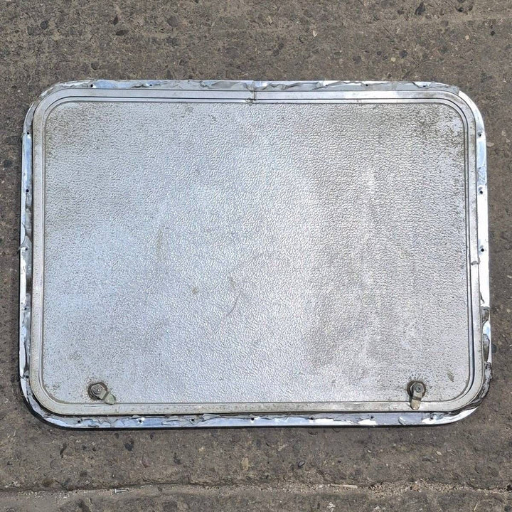 Used Radius Cornered Cargo Door - 30" X 22" X 3/4" - Young Farts RV Parts
