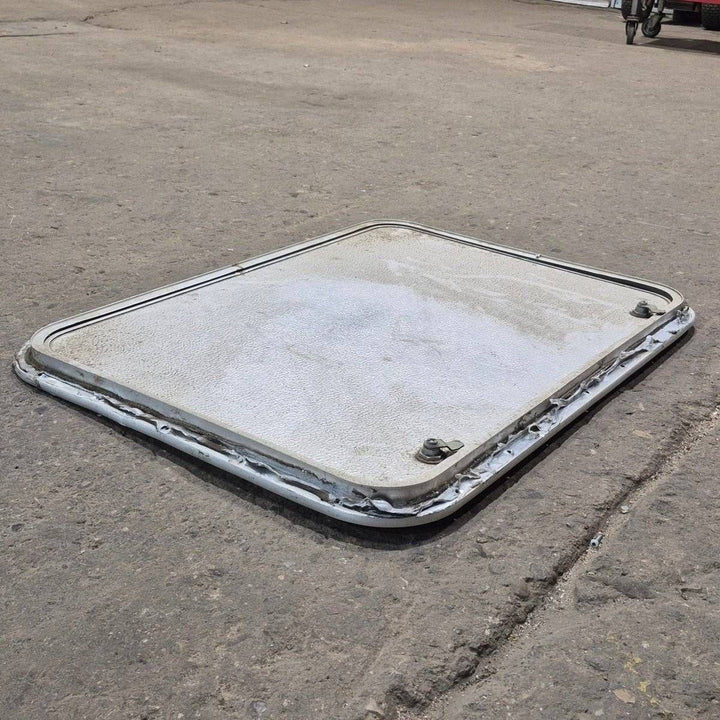 Used Radius Cornered Cargo Door - 30" X 22" X 3/4" - Young Farts RV Parts
