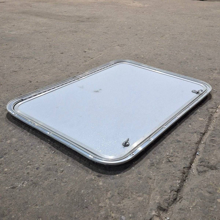 Used Radius Cornered Cargo Door - 30" X 22" X 3/4" - Young Farts RV Parts