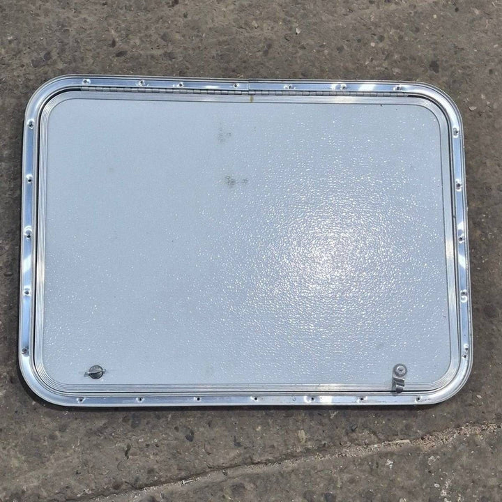 Used Radius Cornered Cargo Door - 30" X 22" X 3/4" - Young Farts RV Parts