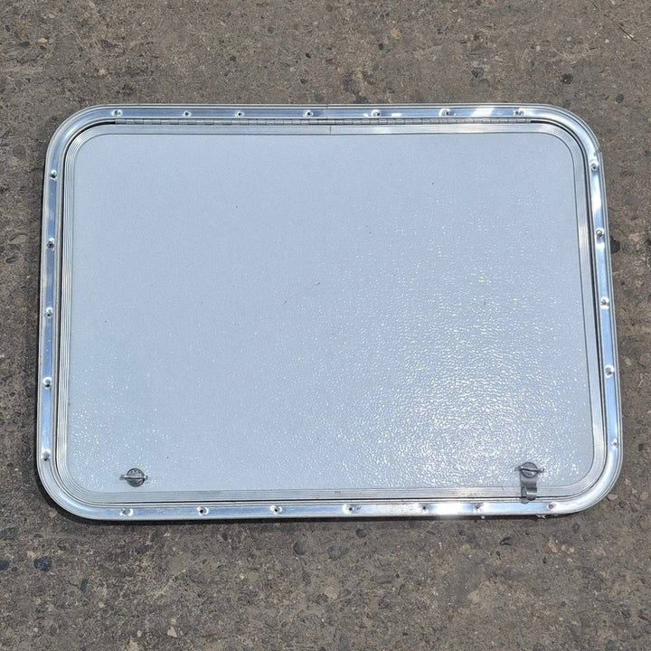 Used Radius Cornered Cargo Door - 30" X 22" X 3/4" - Young Farts RV Parts