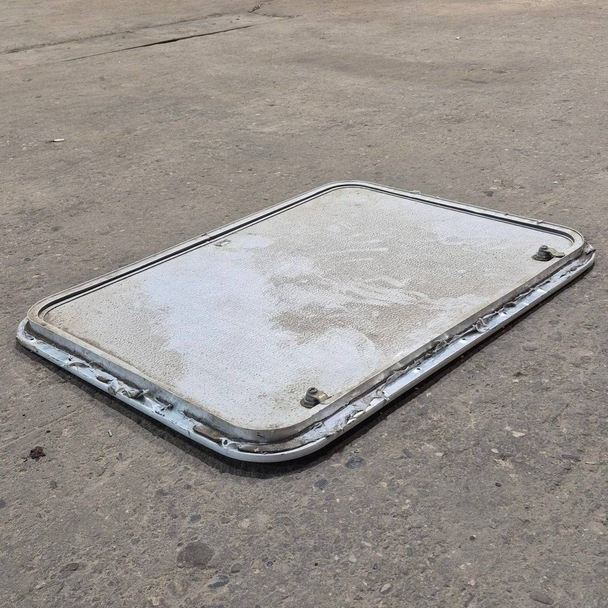 Used Radius Cornered Cargo Door - 30" X 22" X 3/4" - Young Farts RV Parts