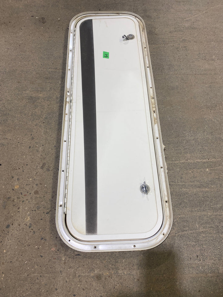 Used Radius Cornered Cargo Door 35 3/4" W x 10 3/4" H x 3/4" D - Young Farts RV Parts