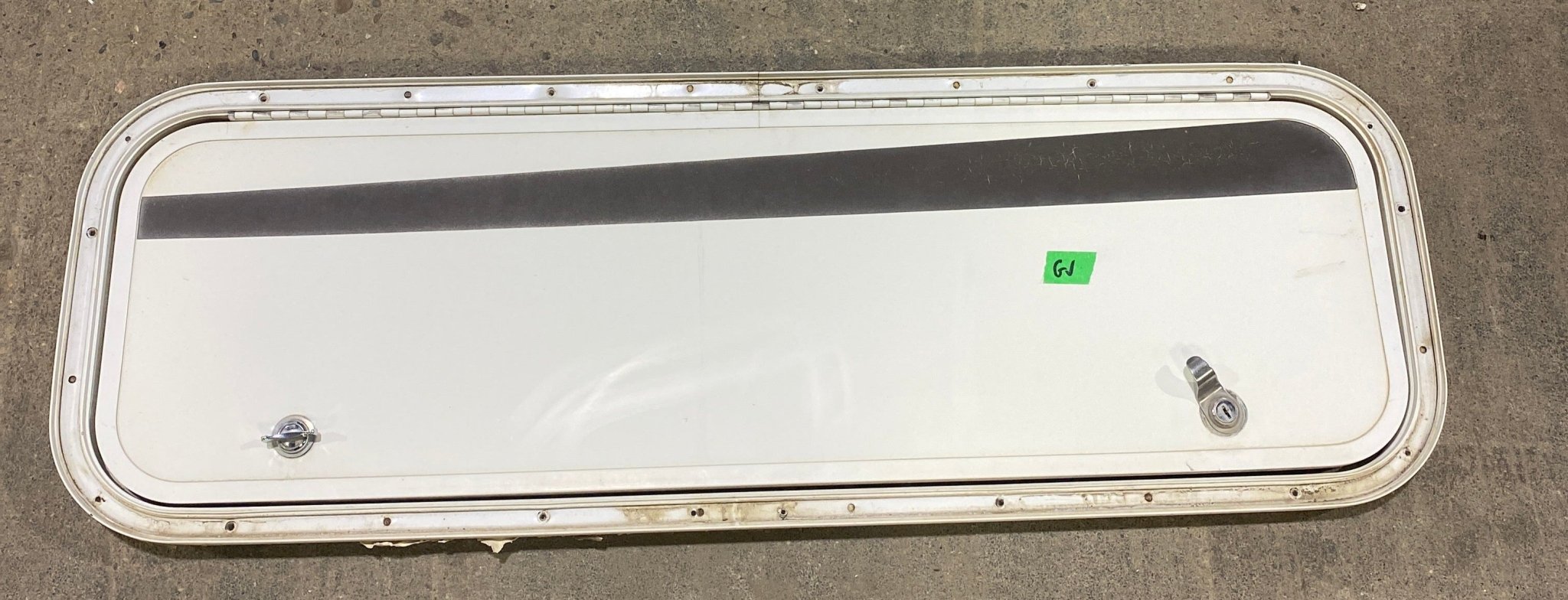 Used Radius Cornered Cargo Door 35 3/4" W x 10 3/4" H x 3/4" D - Young Farts RV Parts