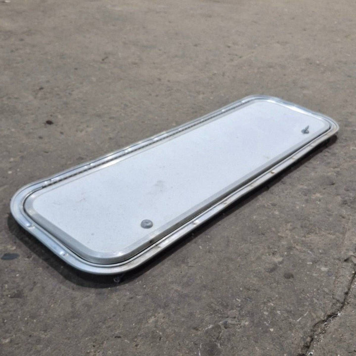 Used Radius Cornered Cargo Door - 36" X 10 7/8" X 3/4" - Young Farts RV Parts