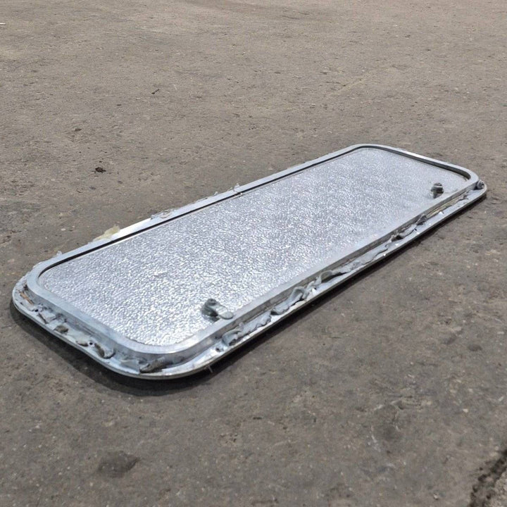 Used Radius Cornered Cargo Door - 36" X 10 7/8" X 3/4" - Young Farts RV Parts