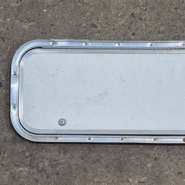 Used Radius Cornered Cargo Door - 36" X 10 7/8" X 3/4" - Young Farts RV Parts