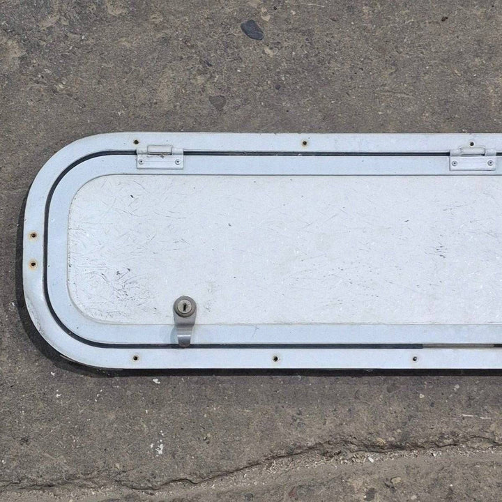 Used Radius Cornered Cargo Door - 37 7/8" X 8 7/8" X 1/2" - Young Farts RV Parts