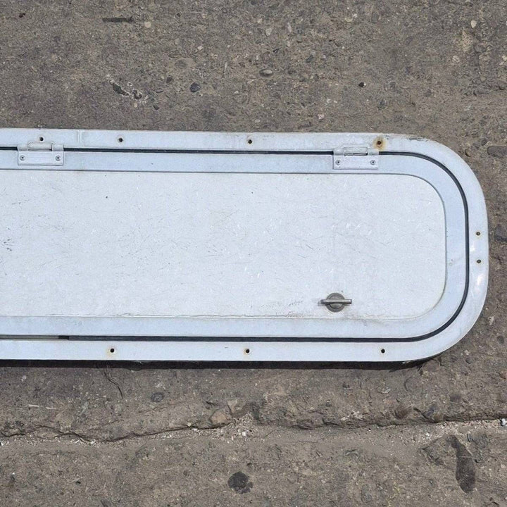 Used Radius Cornered Cargo Door - 37 7/8" X 8 7/8" X 1/2" - Young Farts RV Parts