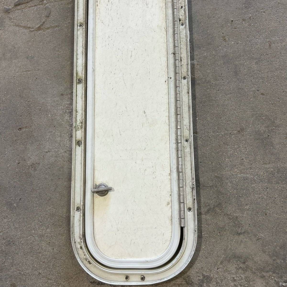 Used Radius Cornered Cargo Door - 39.0 X 6.875 X .75 - Young Farts RV Parts