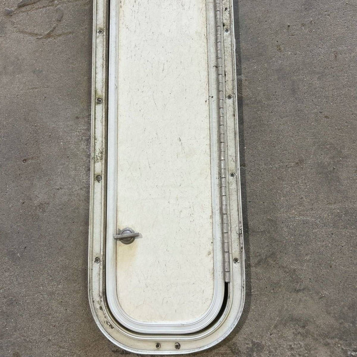 Used Radius Cornered Cargo Door - 39.0 X 6.875 X .75 - Young Farts RV Parts