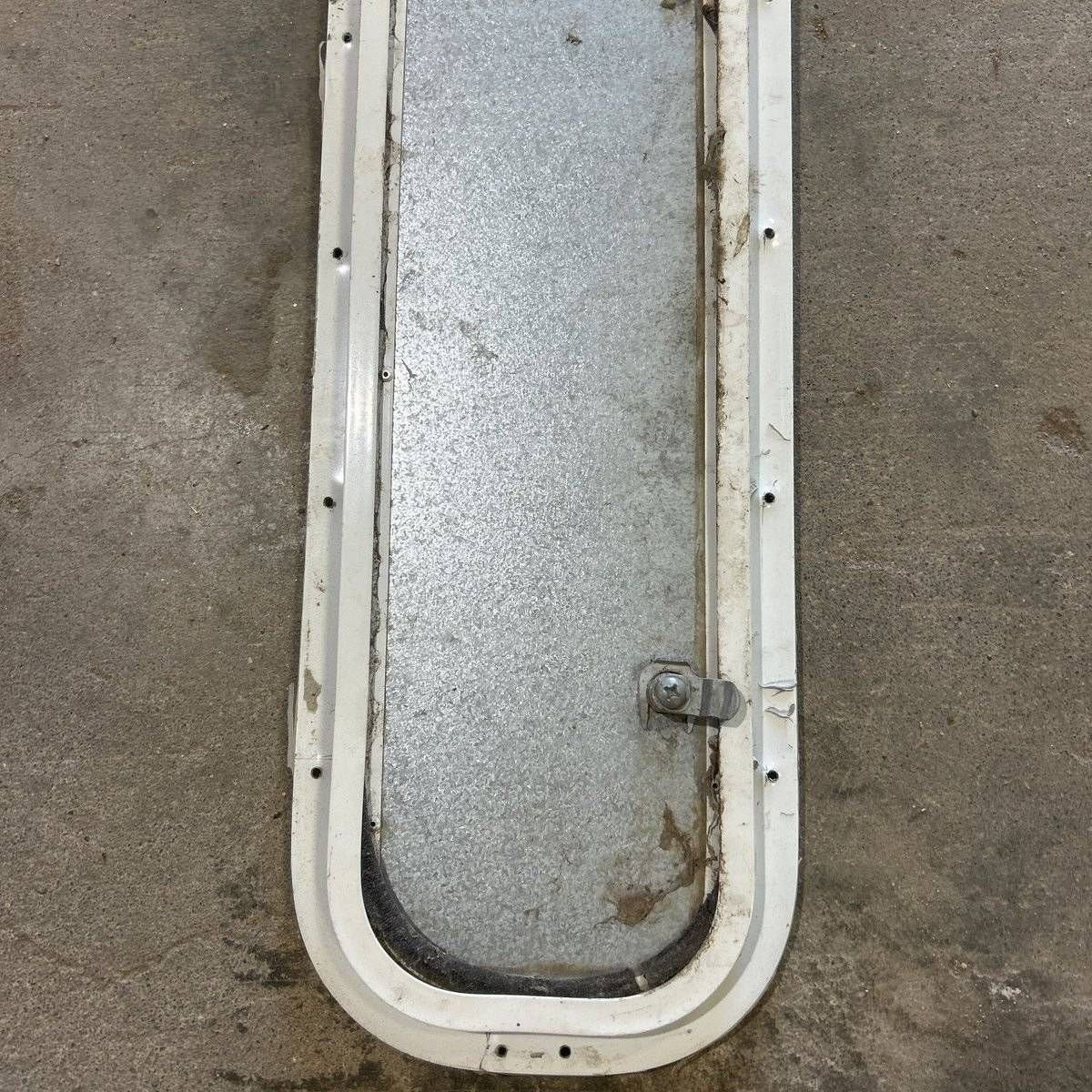Used Radius Cornered Cargo Door - 39.0 X 6.875 X .75 - Young Farts RV Parts