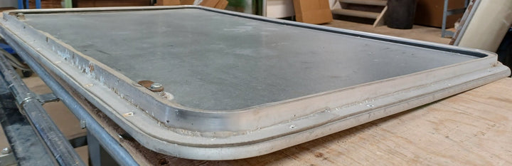 Used Radius Cornered Cargo Door 43 3/4" x 25 3/4" x 7/8" D - Young Farts RV Parts