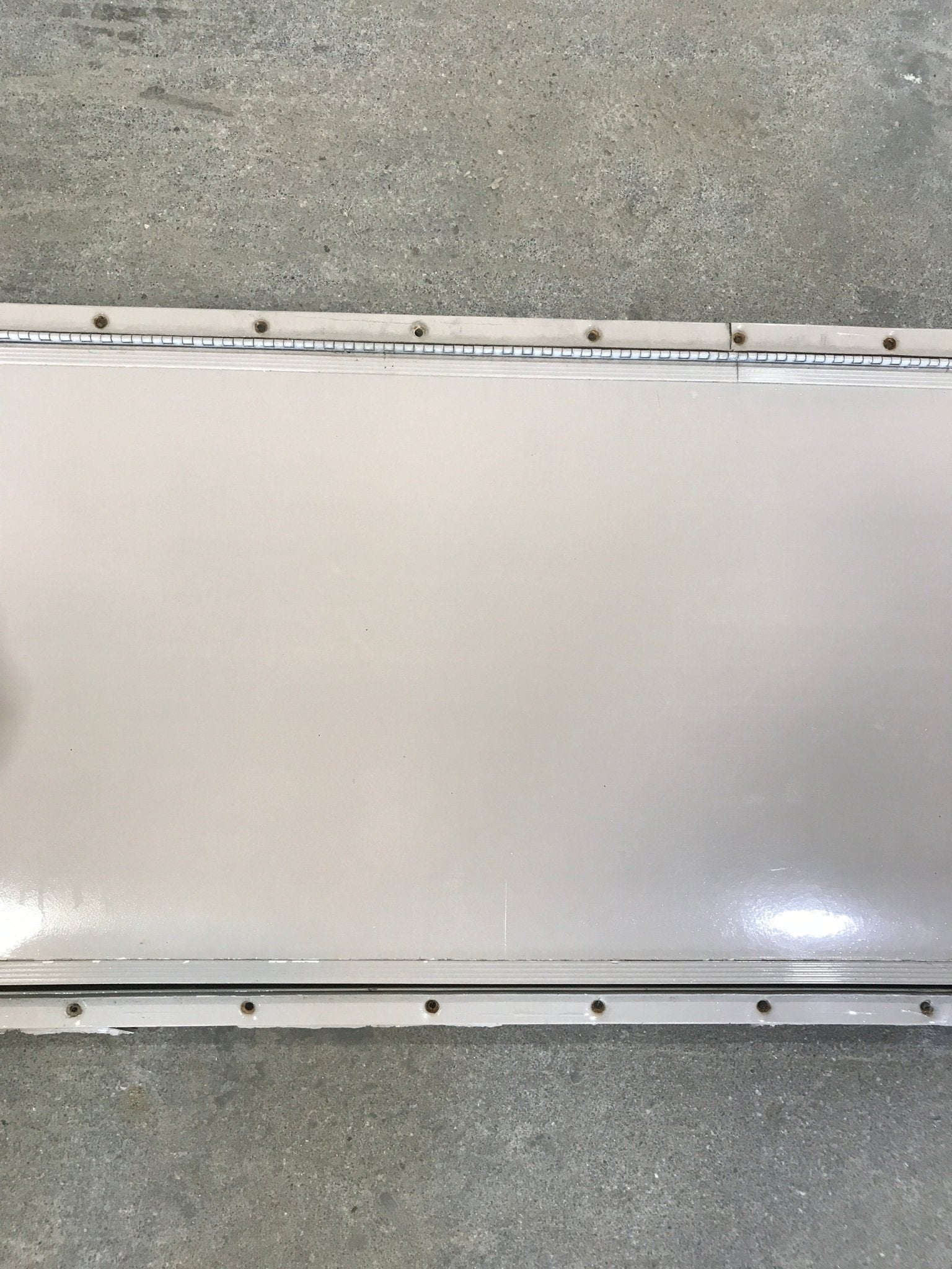 Used Radius Cornered Cargo Door 47 3/4" W x 15 3/5" H x 1/2" D - Young Farts RV Parts