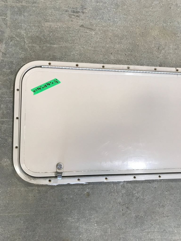 Used Radius Cornered Cargo Door 47 3/4" W x 15 3/5" H x 1/2" D - Young Farts RV Parts