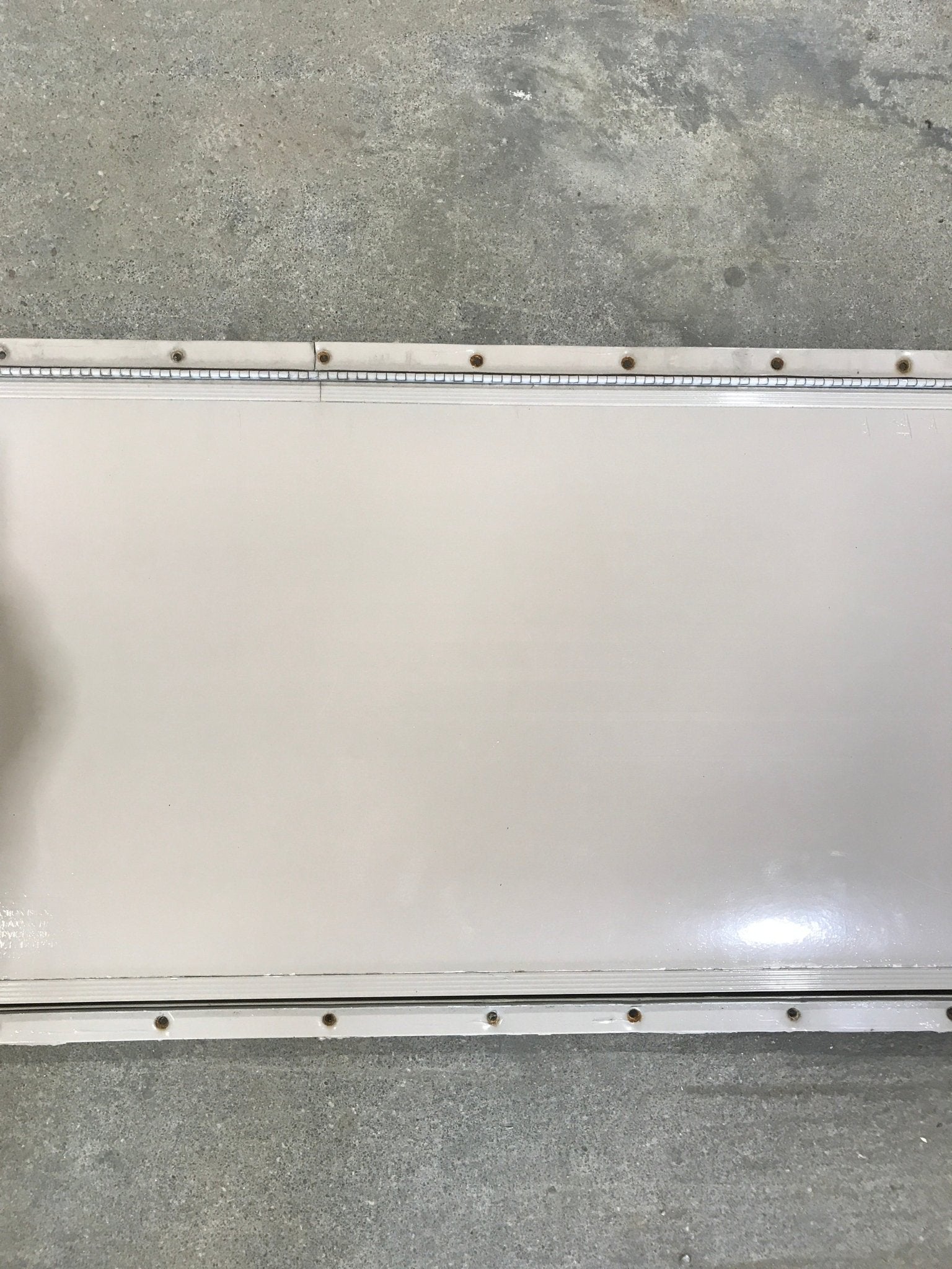 Used Radius Cornered Cargo Door 47 3/4" W x 15 3/5" H x 1/2" D - Young Farts RV Parts