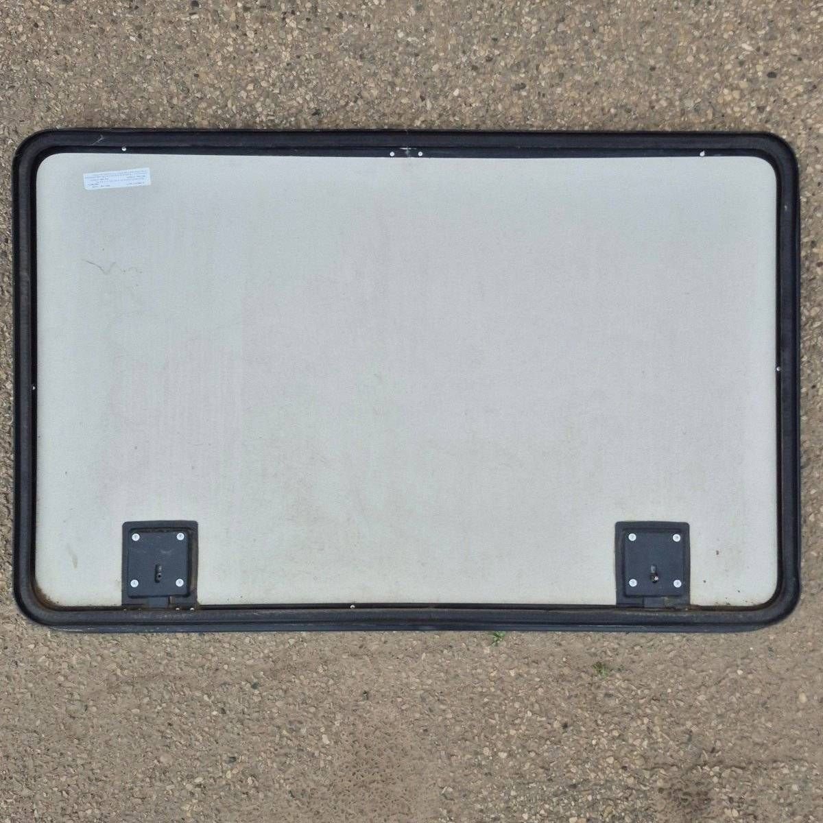 Used Radius Cornered Cargo Door - 47 5/8" X 30 1/8" X 2" - Young Farts RV Parts