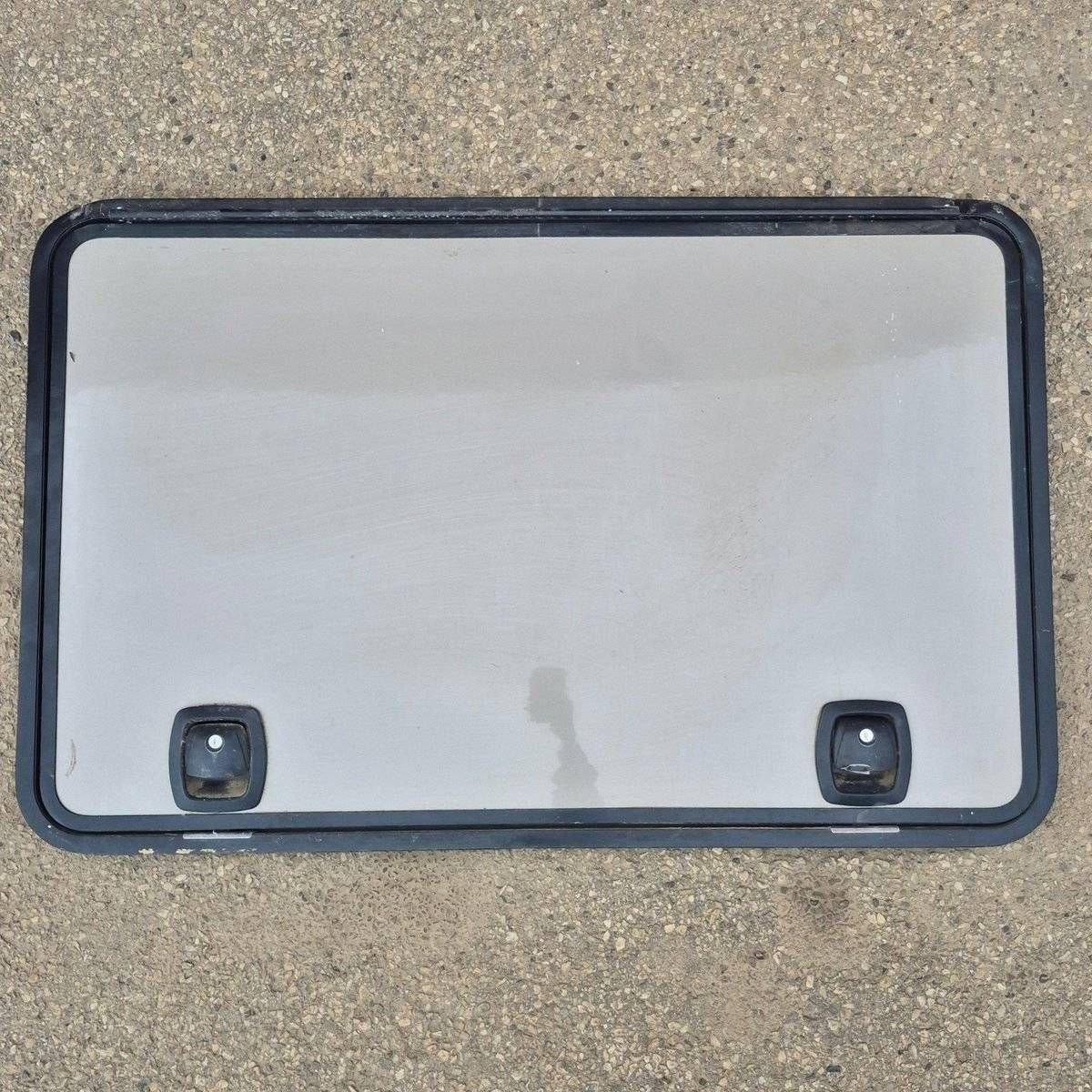 Used Radius Cornered Cargo Door - 47 5/8" X 30 1/8" X 2" - Young Farts RV Parts