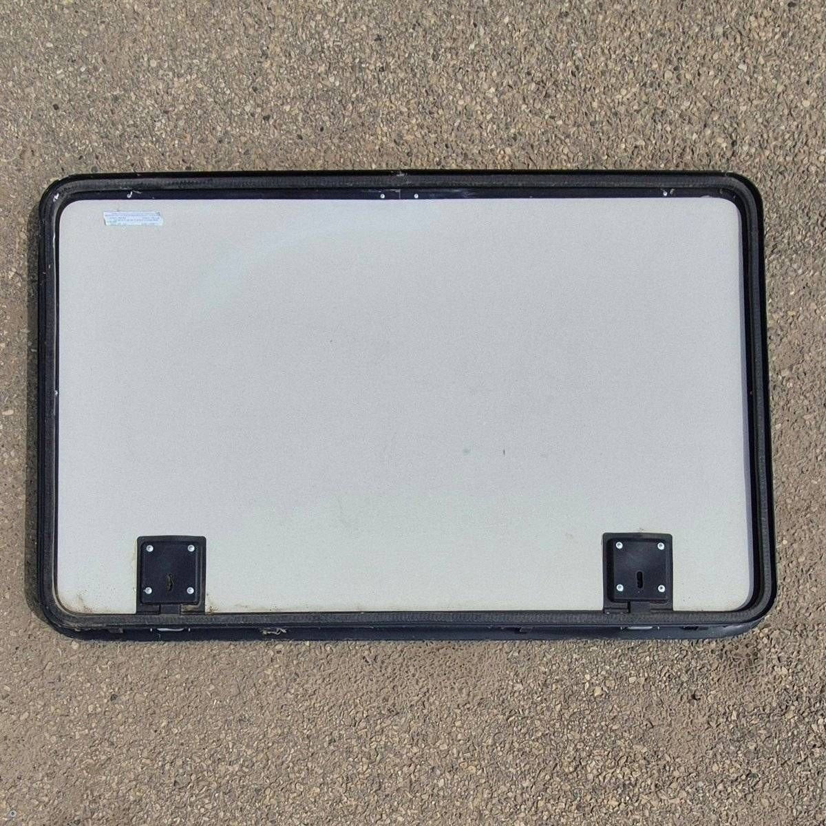Used Radius Cornered Cargo Door - 47 5/8" X 30 1/8" X 2" - Young Farts RV Parts