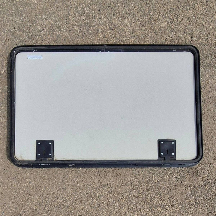 Used Radius Cornered Cargo Door - 47 5/8" X 30 1/8" X 2" - Young Farts RV Parts