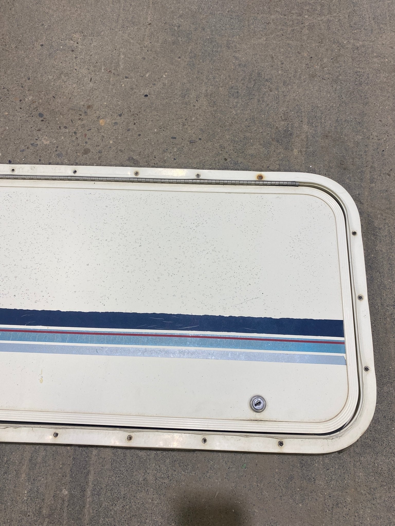 Used Radius Cornered Cargo Door 49 3/4" W x 14 3/4" H X 1/2" D - Young Farts RV Parts