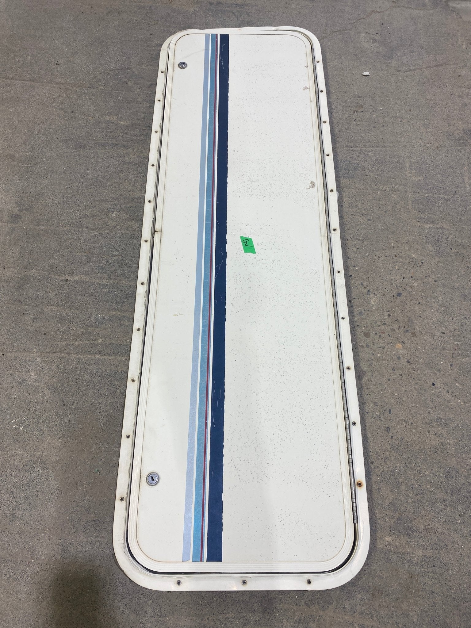 Used Radius Cornered Cargo Door 49 3/4" W x 14 3/4" H X 1/2" D - Young Farts RV Parts