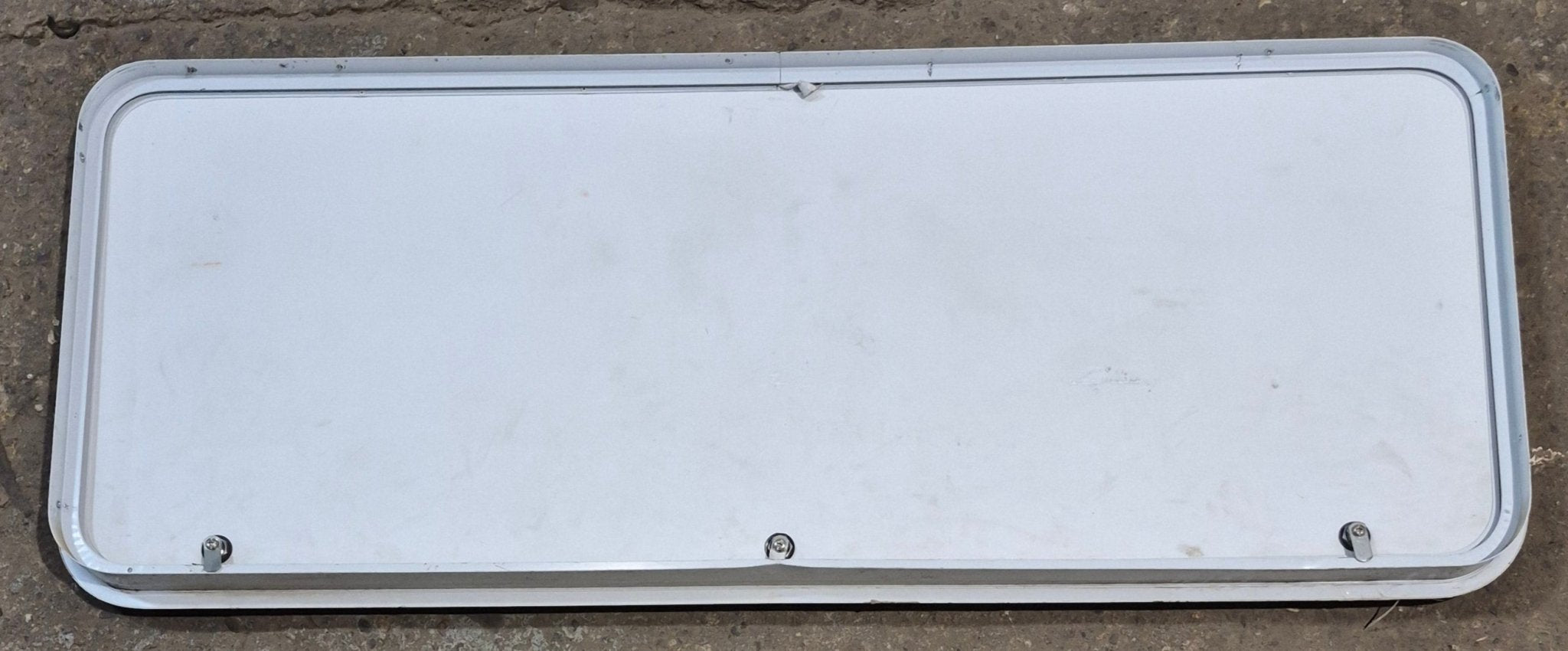 Used Radius Cornered Cargo Door 55 3/4" x 21 1/2" x 2" D - Young Farts RV Parts