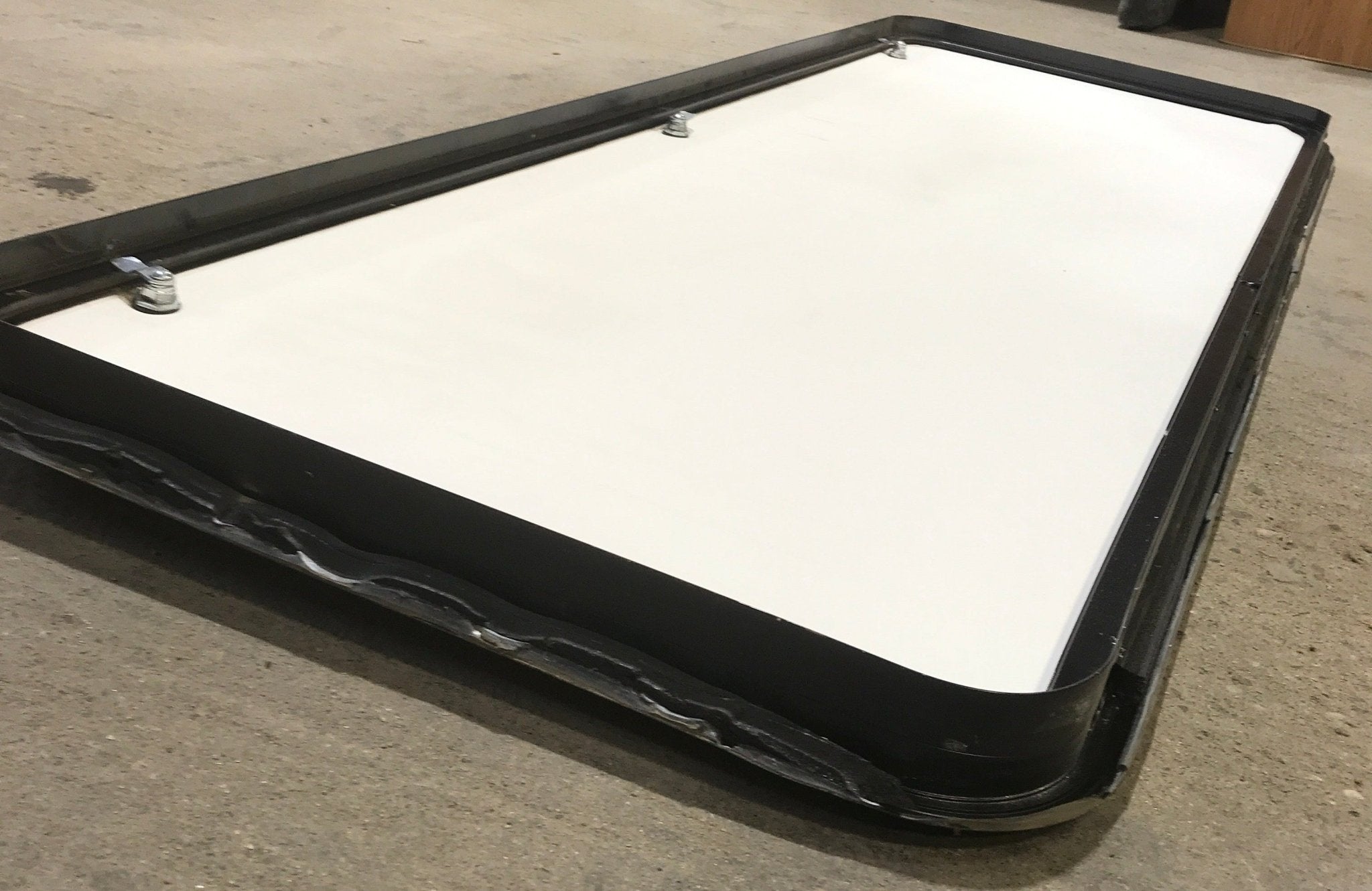 Used Radius Cornered Cargo Door 64 1/2" x 22 1/2" x 2" D - Young Farts RV Parts