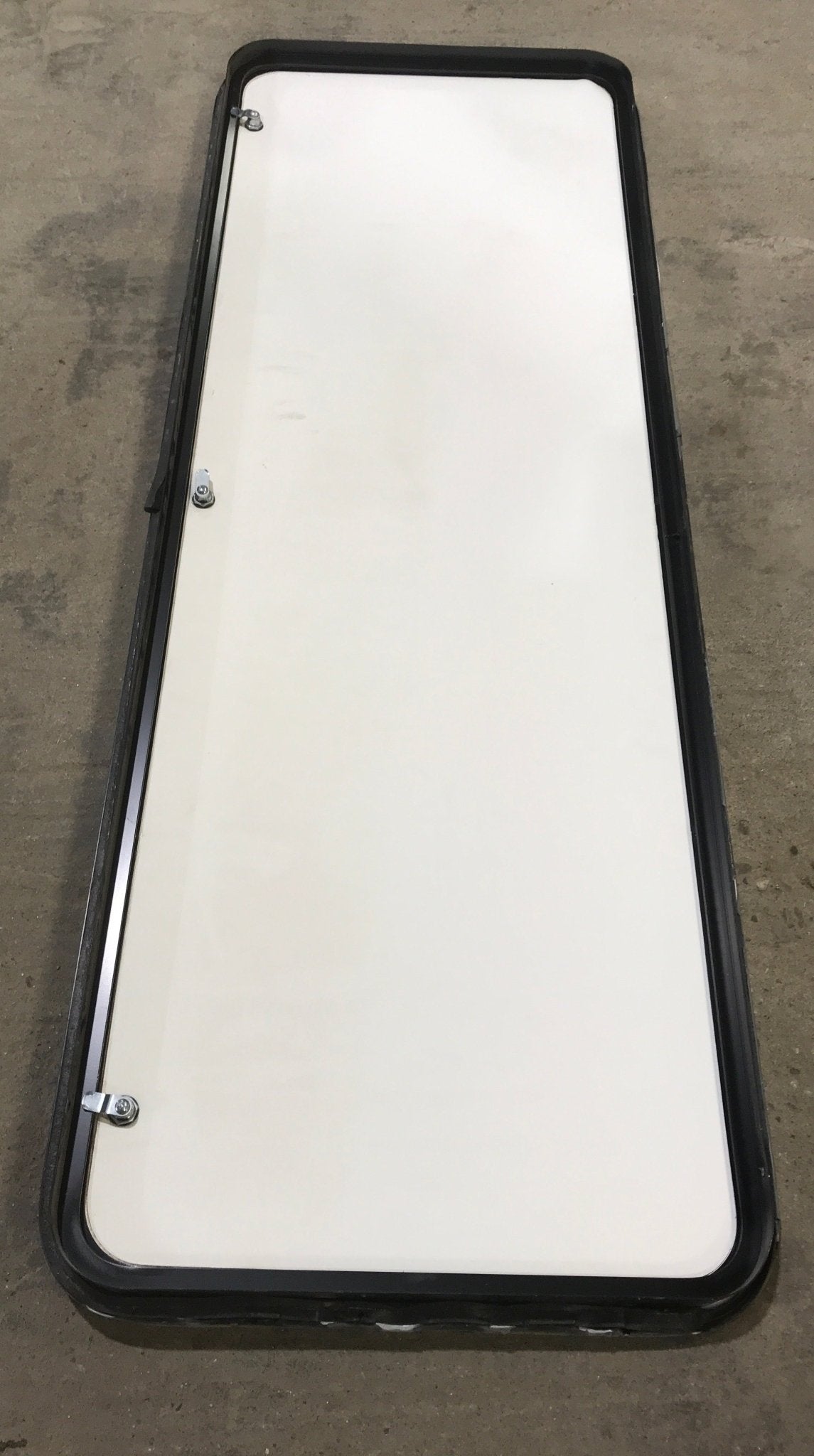 Used Radius Cornered Cargo Door 64 1/2" x 22 1/2" x 2" D - Young Farts RV Parts