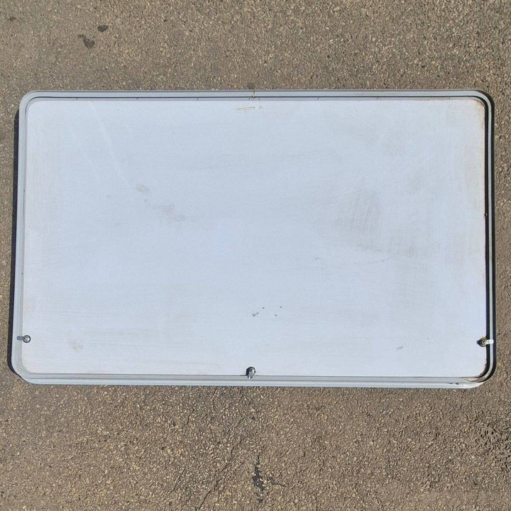 Used Radius Cornered Cargo Door - 69 3/4" X 42 7/8" X 2" - Young Farts RV Parts