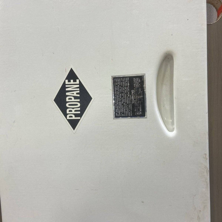 Used Radius Cornered Propane Cargo Door - 63.25 X 16.75 X .75 - Young Farts RV Parts
