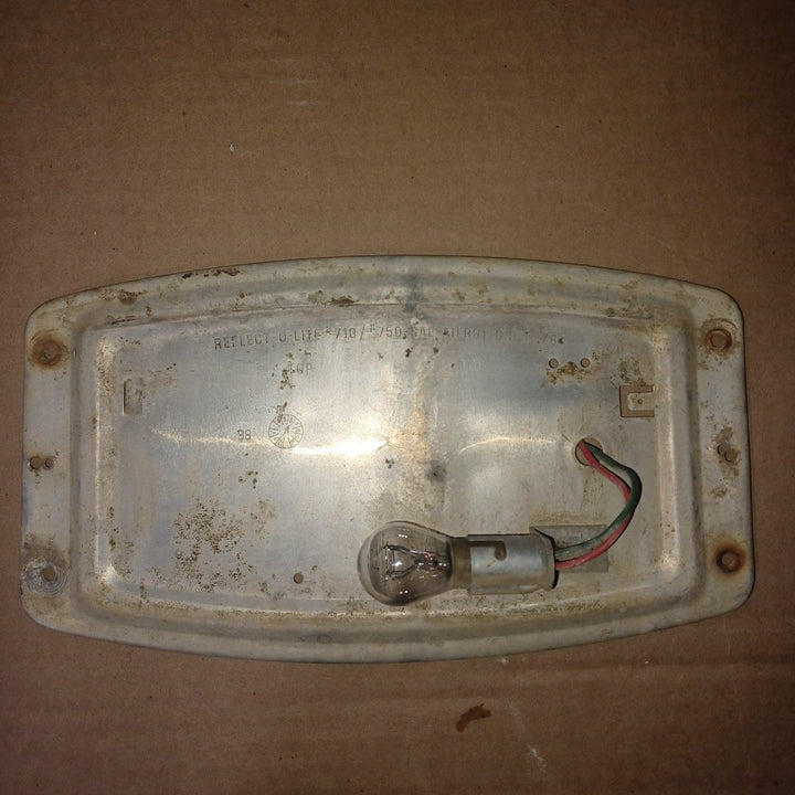 Used Reflect-O-Lite 710/750 License Plate Bracket - Young Farts RV Parts