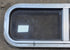 Used Silver Radius Opening Window : 26 1/2" W x 8 1/2" H x 1 3/4" D - Young Farts RV Parts