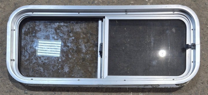 Used Silver Radius Opening Window : 30" W x 11 1/2" H x 1 3/4" D - Young Farts RV Parts