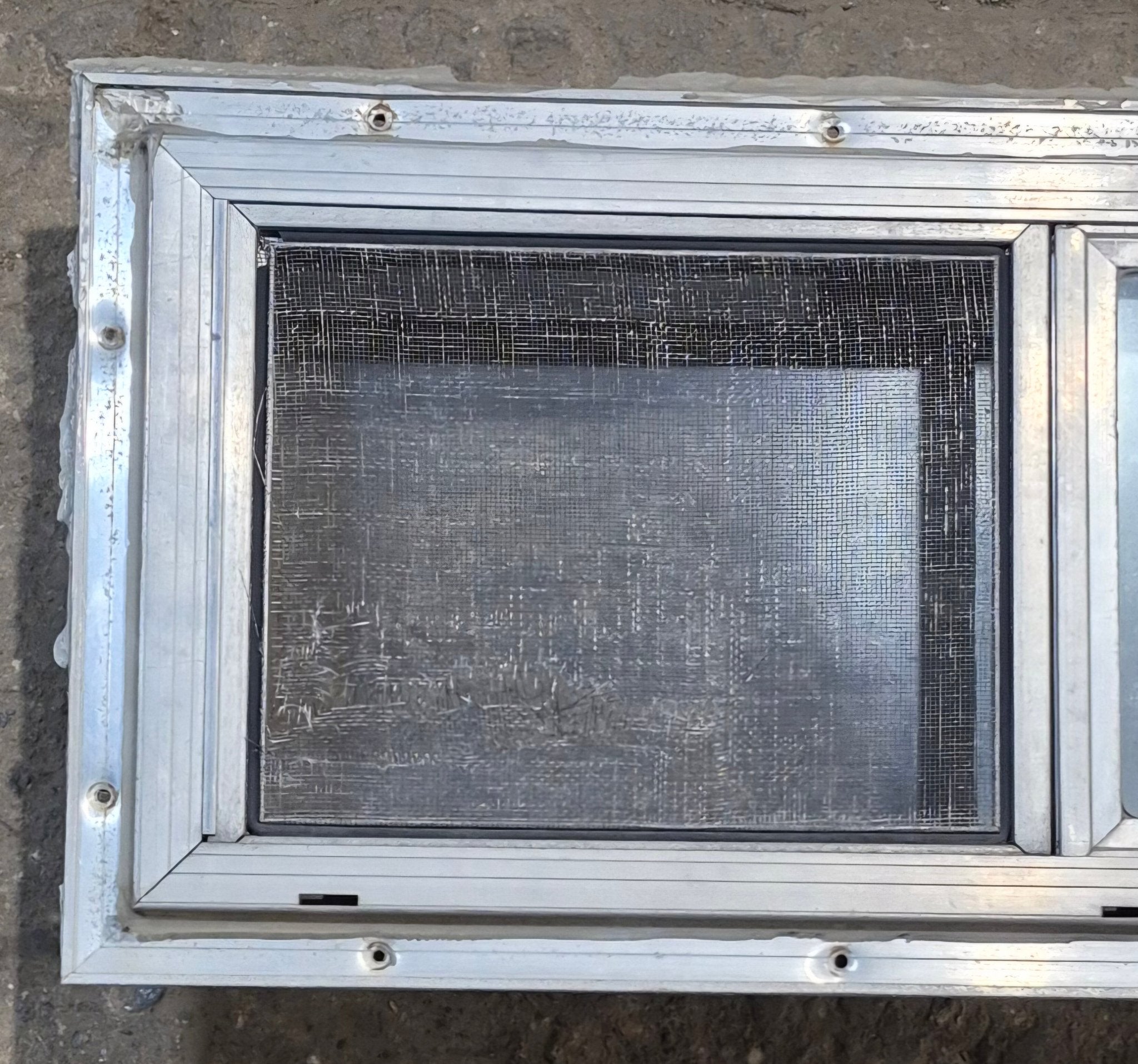 Used Silver Square Opening Window: 24" W x 10" H x 2 1/2" D - Young Farts RV Parts