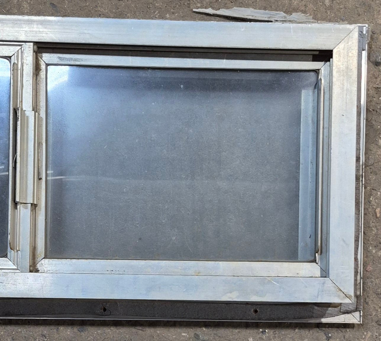 Used Silver Square Opening Window: 24" W x 10" H x 2 1/2" D - Young Farts RV Parts
