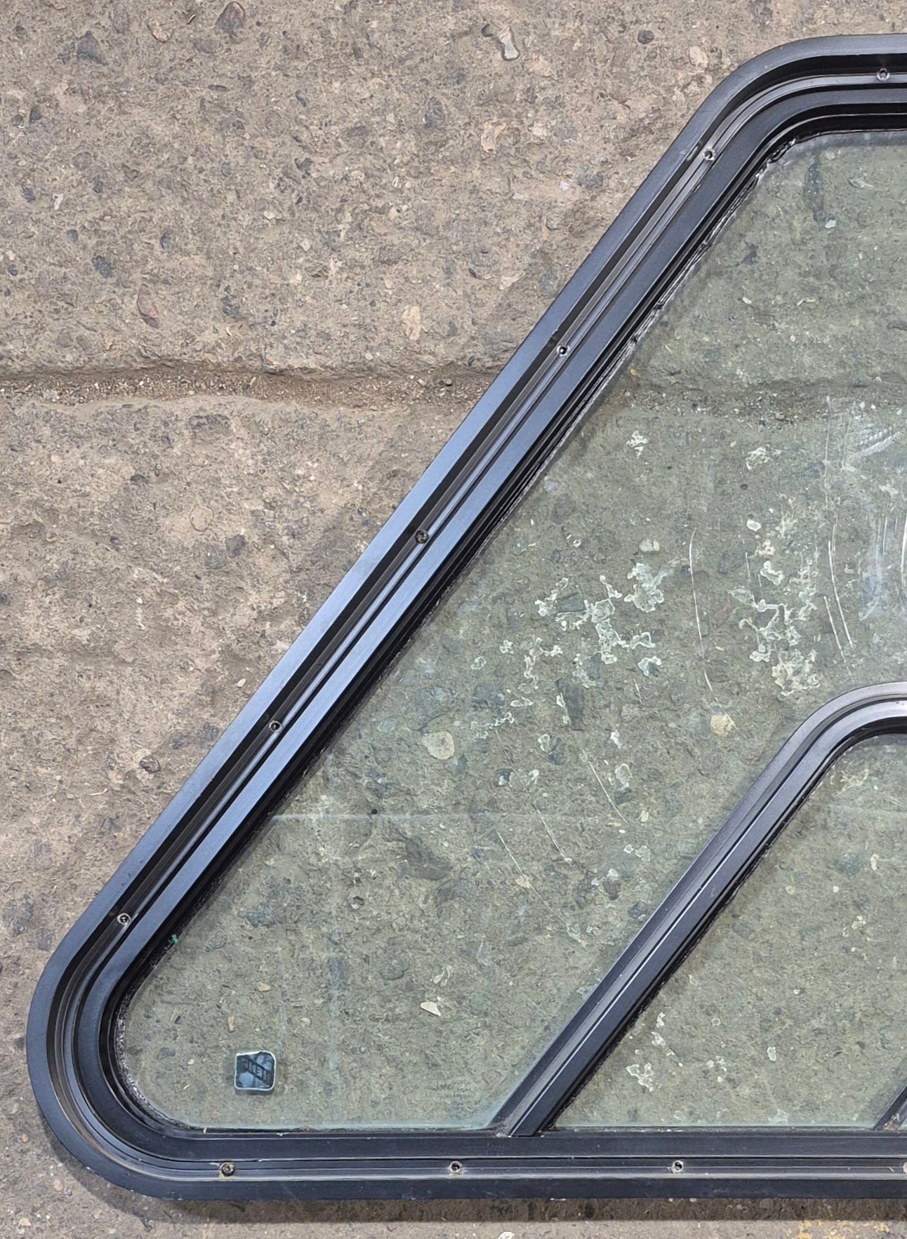 Used Slanted Black Radius Opening Window : 36 1/4" W x 26 1/2" H x 1 3/4" D - Motorhome Front Passenger Side - Young Farts RV Parts